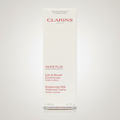 Clarins Brightening Milk Treatment Lotion packaging on a light gray background