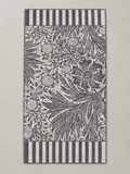 Charcoal gray and white botanical floral bath towel with striped borders measuring 70 x 146 cm