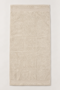 Cream Red Tag Fashion cotton terry bath towel measuring 70 x 140 cm