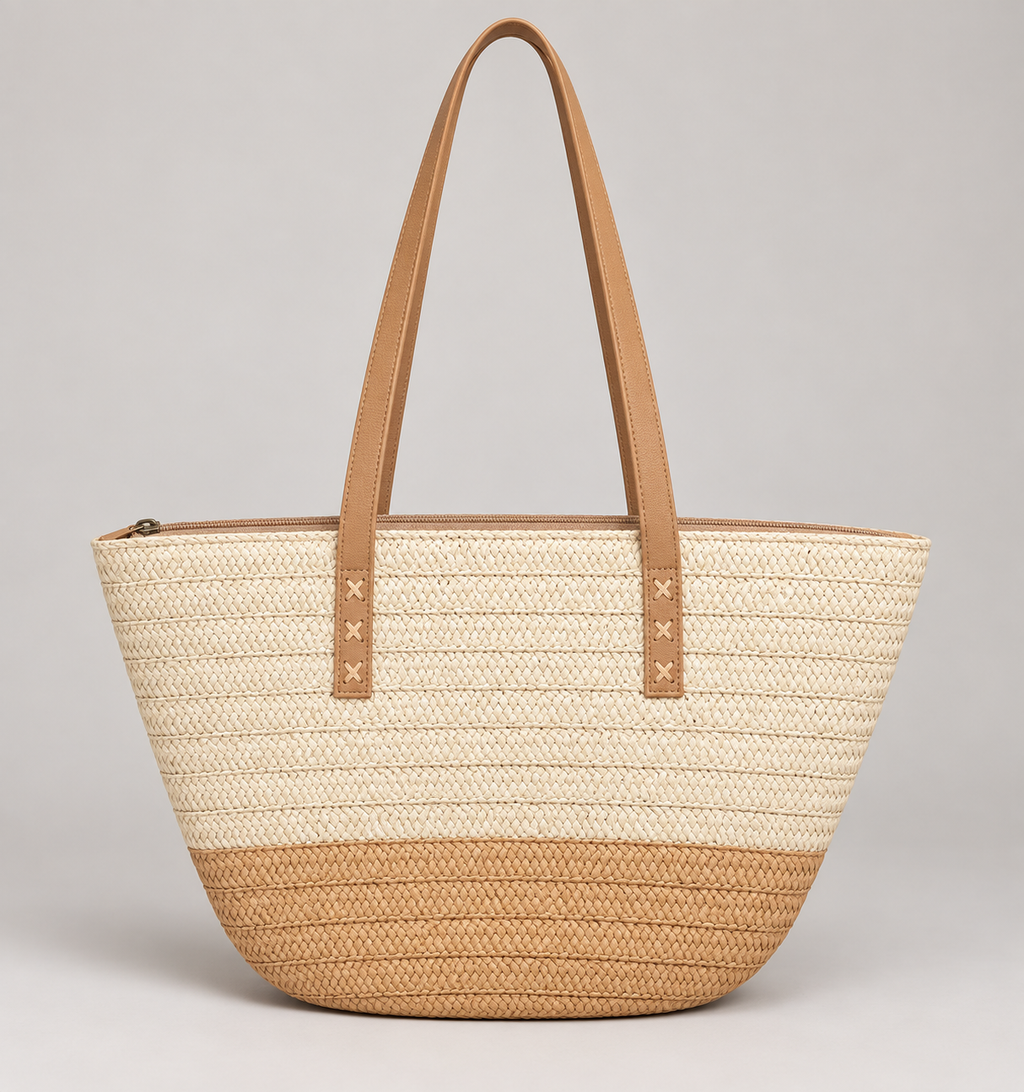 Cream and tan tapered woven zip tote, front studio view