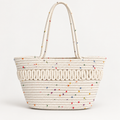 Ivory speckled rope tote bag with looped front band on a light gray studio background