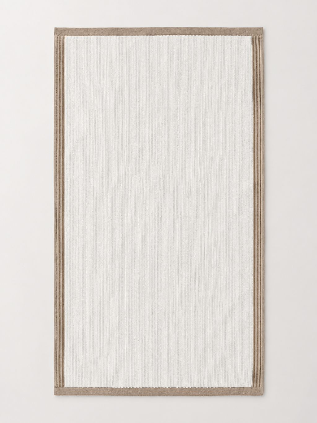 Ivory ribbed towel with taupe border measuring 72 x 133 cm on a light grey studio background