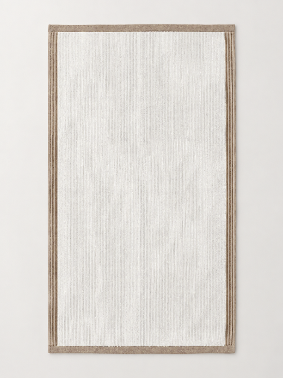 Ivory ribbed towel with taupe border measuring 72 x 133 cm on a light grey studio background