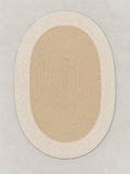 Oval woven floor mat with cream border, 99 × 69 cm