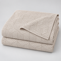 STIL CUBE beige cotton bedspread 220 x 240 cm folded studio view